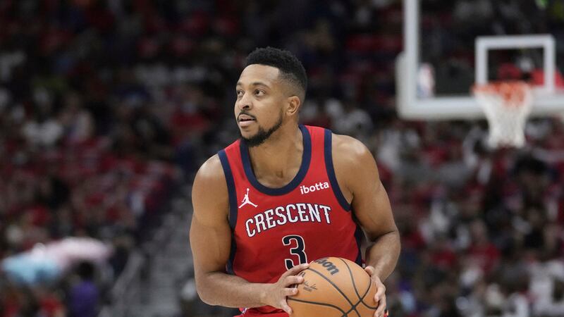 New Orleans Pelicans guard CJ McCollum (3) moves the ball down court in the first half of an...