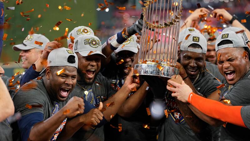 The Houston Astros celebrate their 4-1 World Series win against the Philadelphia Phillies in...