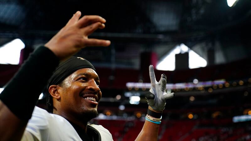 New Orleans Saints quarterback Jameis Winston (2) leaves the field after defeating Atlanta...