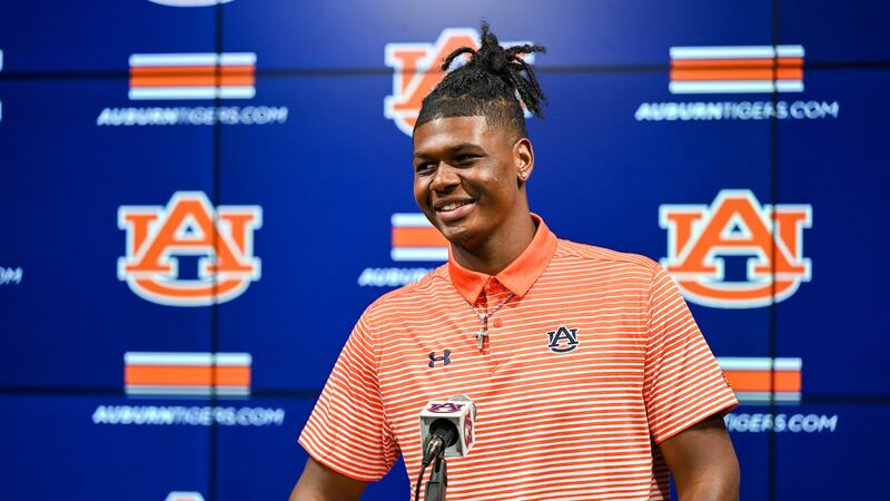 T.J. Finley (1) talks about being earning the starting quartback job on Monday.
Auburn...