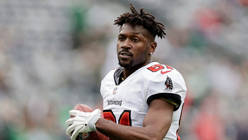 FILE - Tampa Bay Buccaneers wide receiver Antonio Brown (81) walks on the field during an NFL...