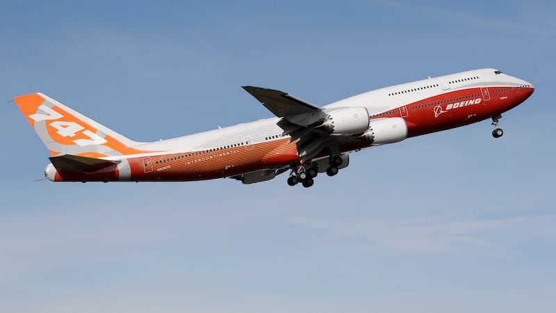FILE - A Boeing 747-8, Boeing's new passenger plane, takes its first flight, Sunday, March 20,...