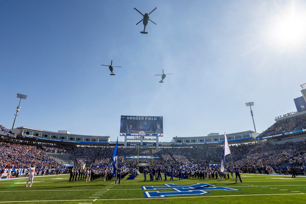 Kentucky celebrates Veteran's Day with a flyover before an NCAA college football game against...