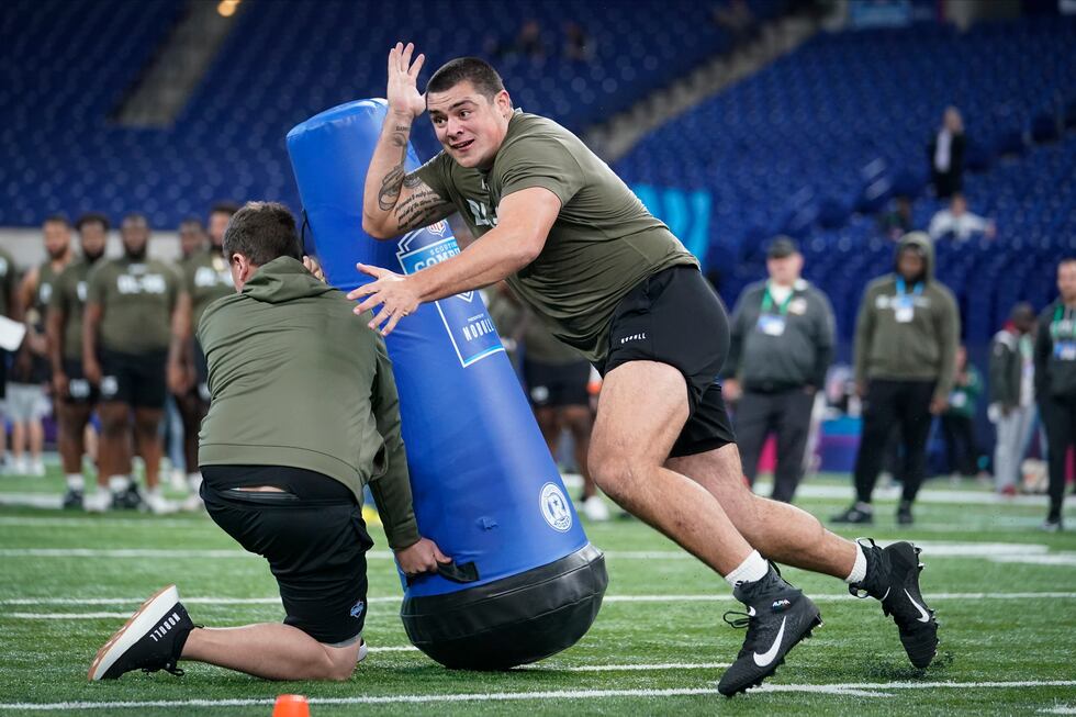 Clemson defensive lineman Bryan Bresee runs a drill at the NFL football scouting combine in...